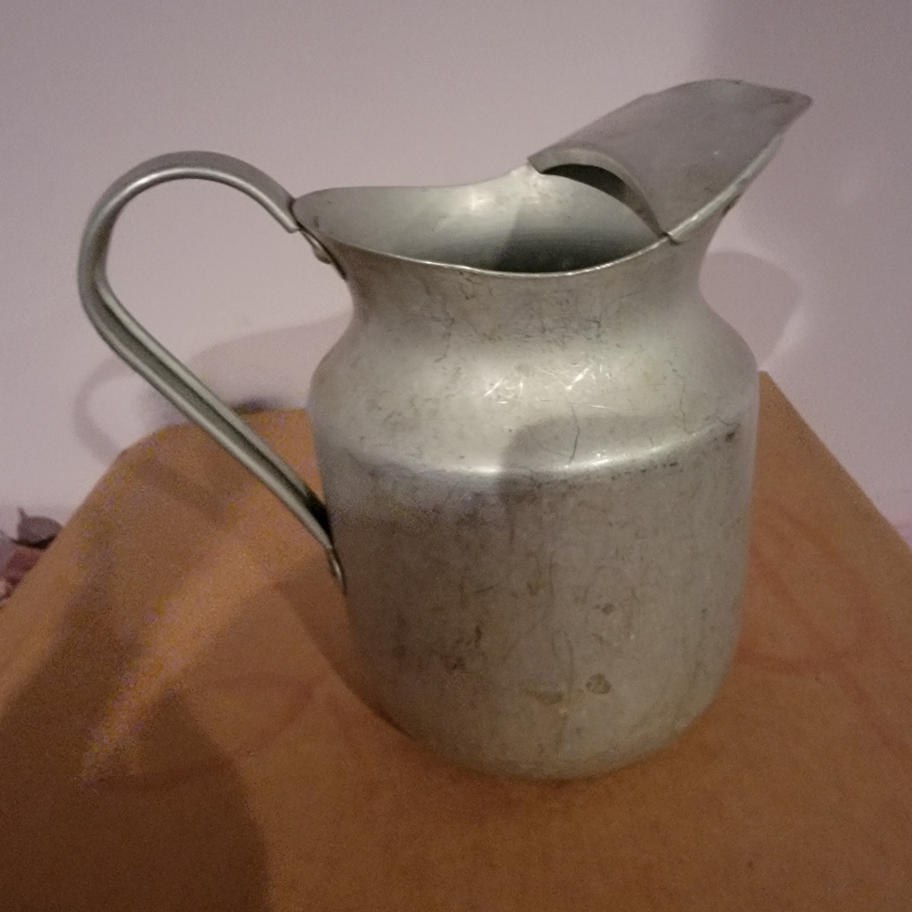 Tin old fashioned watering can
